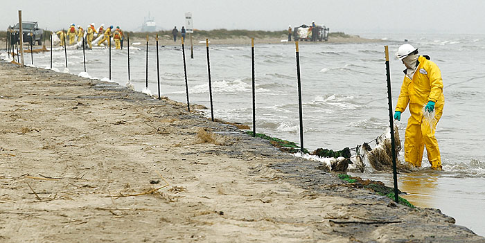 Crews work to clean oil spill